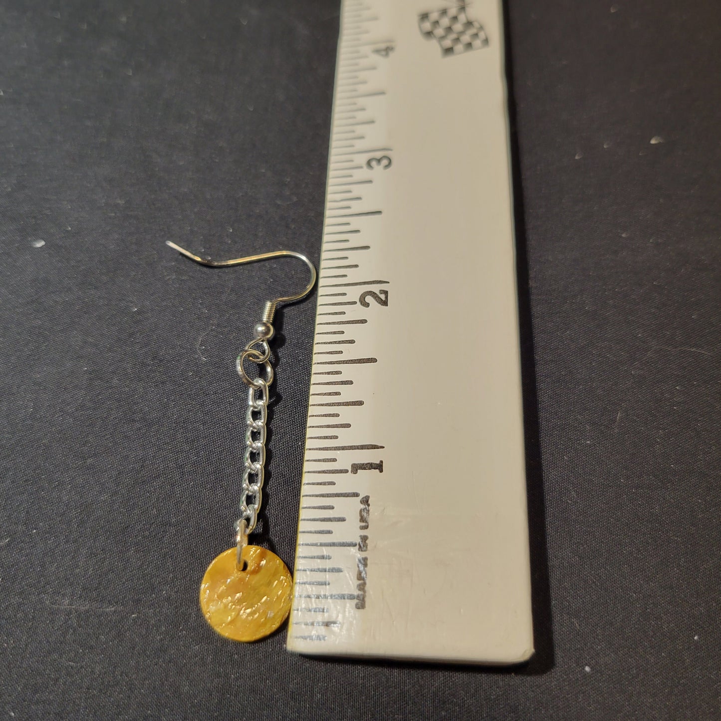 Falling shell disc earrings