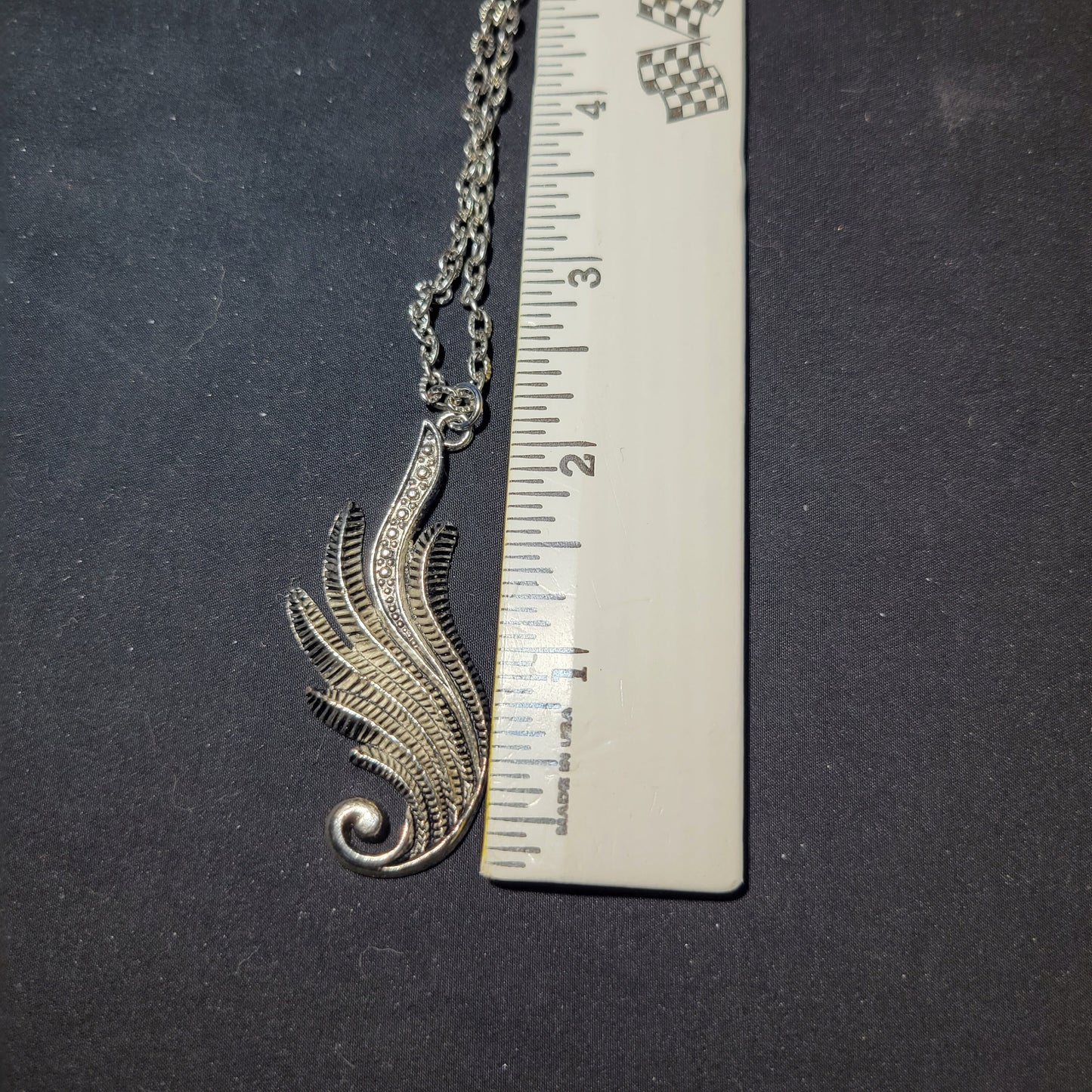 Scrollwork pendant necklace