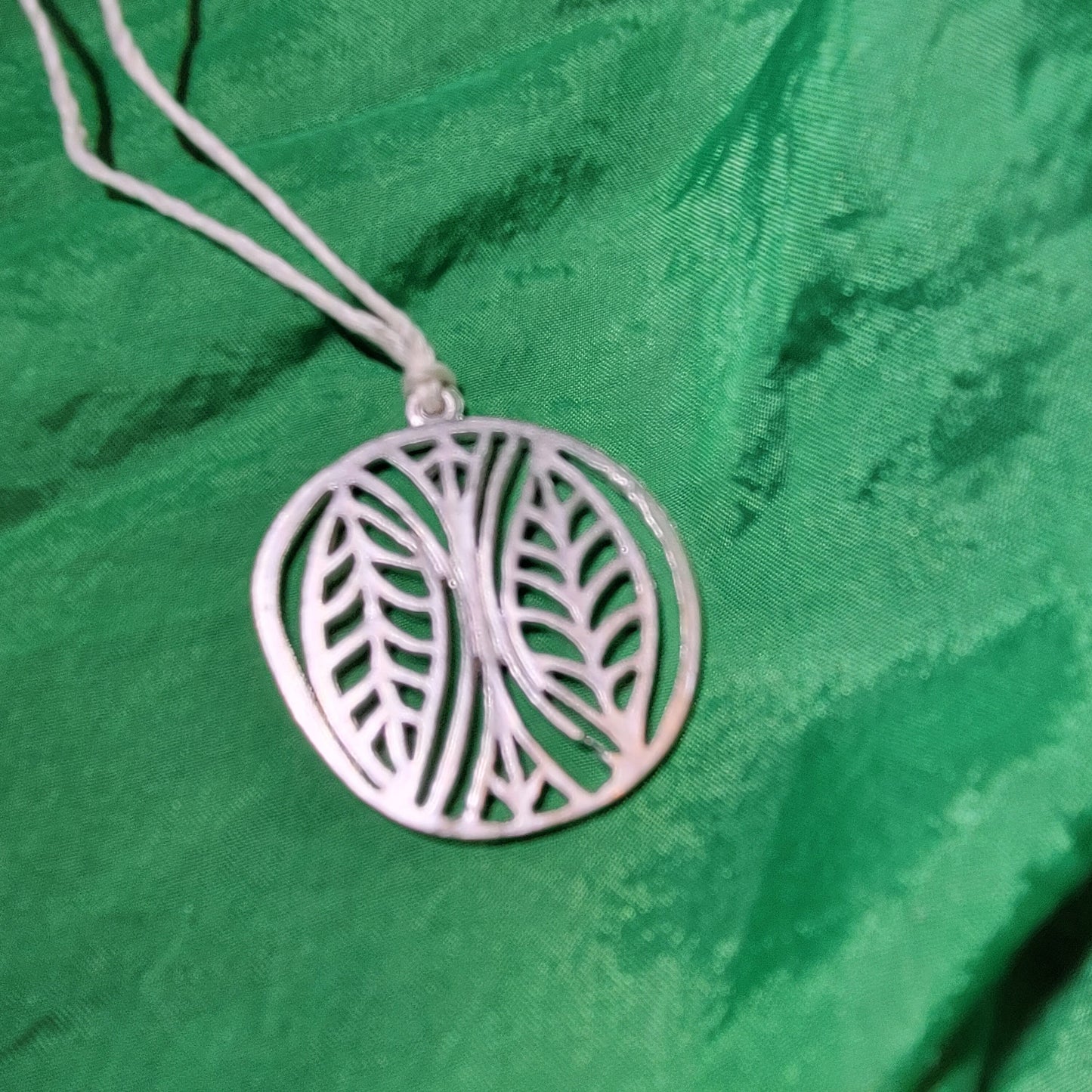 Leaves and arrows pendant necklace