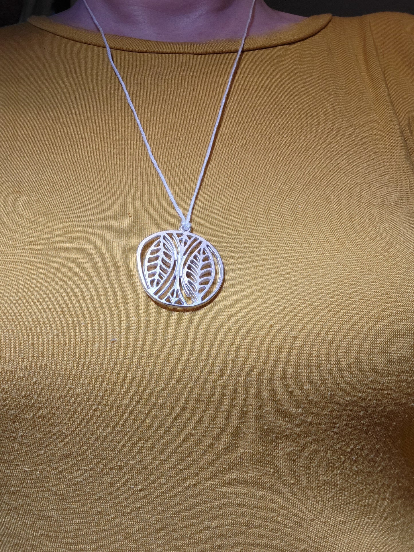 Leaves and arrows pendant necklace