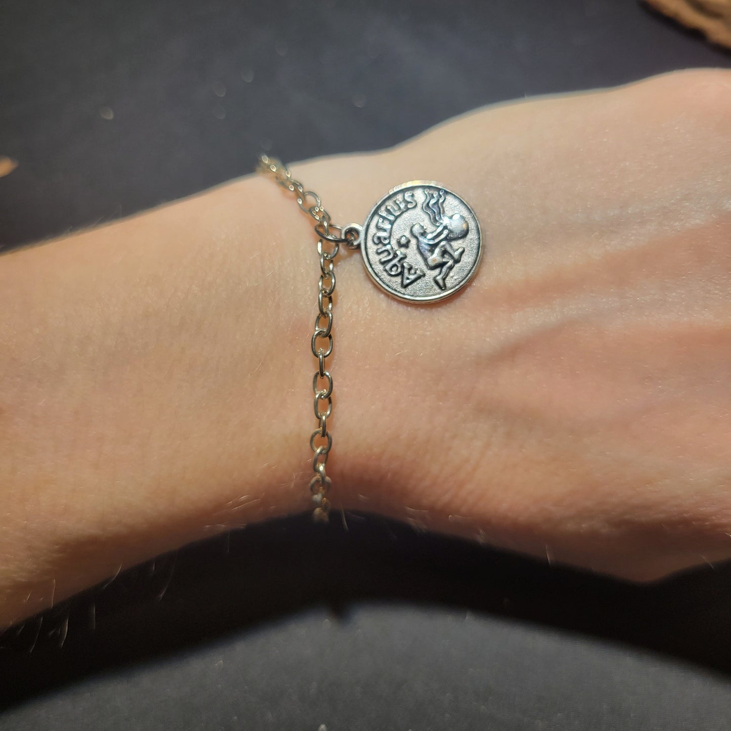 Aquarius charm bracelet